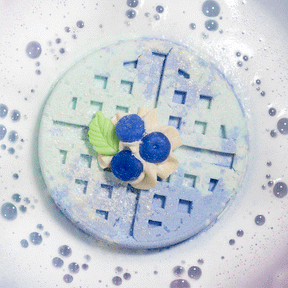 berry whip waffle bath bombs in water